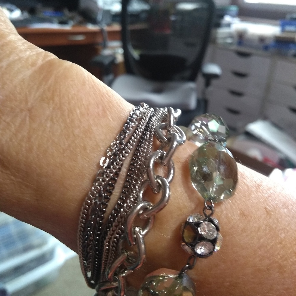 Layered chain and glass bead bracelet.